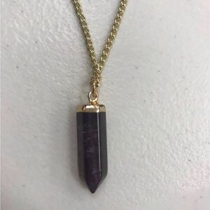 Gold tone amethyst point necklace